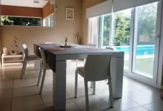 Hermosa casa estilo minimalista en Barrio cerrado La cesarina General Rodriguez foto 3