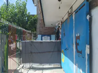 PROPIEDAD COMERCIAL CON VIVIENDA, GARAGE Y AMPLIO TERRENO foto 2