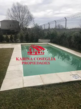 CASA CON PILETA, EN UNA PLANTA , BARRIO CERRADO BARBARITA . foto 5