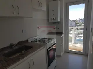Venta departamento 1 dormitorio - 2 baños, edificio Don Bosco foto 2