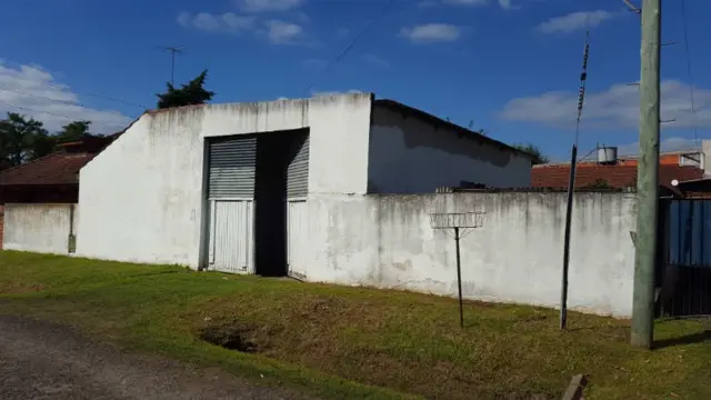 Venta de departamento con galpon