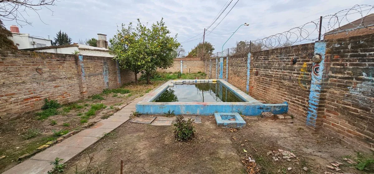 Casa mas terreno ideal para inversión foto 5