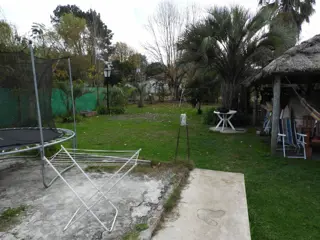 EXCELENTE PROPIEDAD DE TRES AMBIENTES CON ENTRADA PASANTE QUINCHO Y PARRILLA foto 5