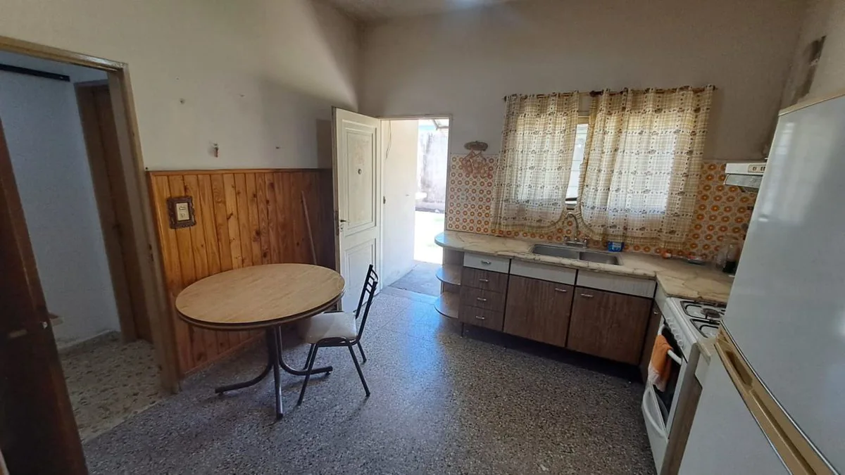 CASA 3 AMBIENTES VENTA MERLO CON JARDIN foto 3