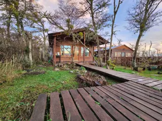 COMPLEJO DE DOS CABAÑAS CON VISTA AL LAGO FAGNANO foto 3