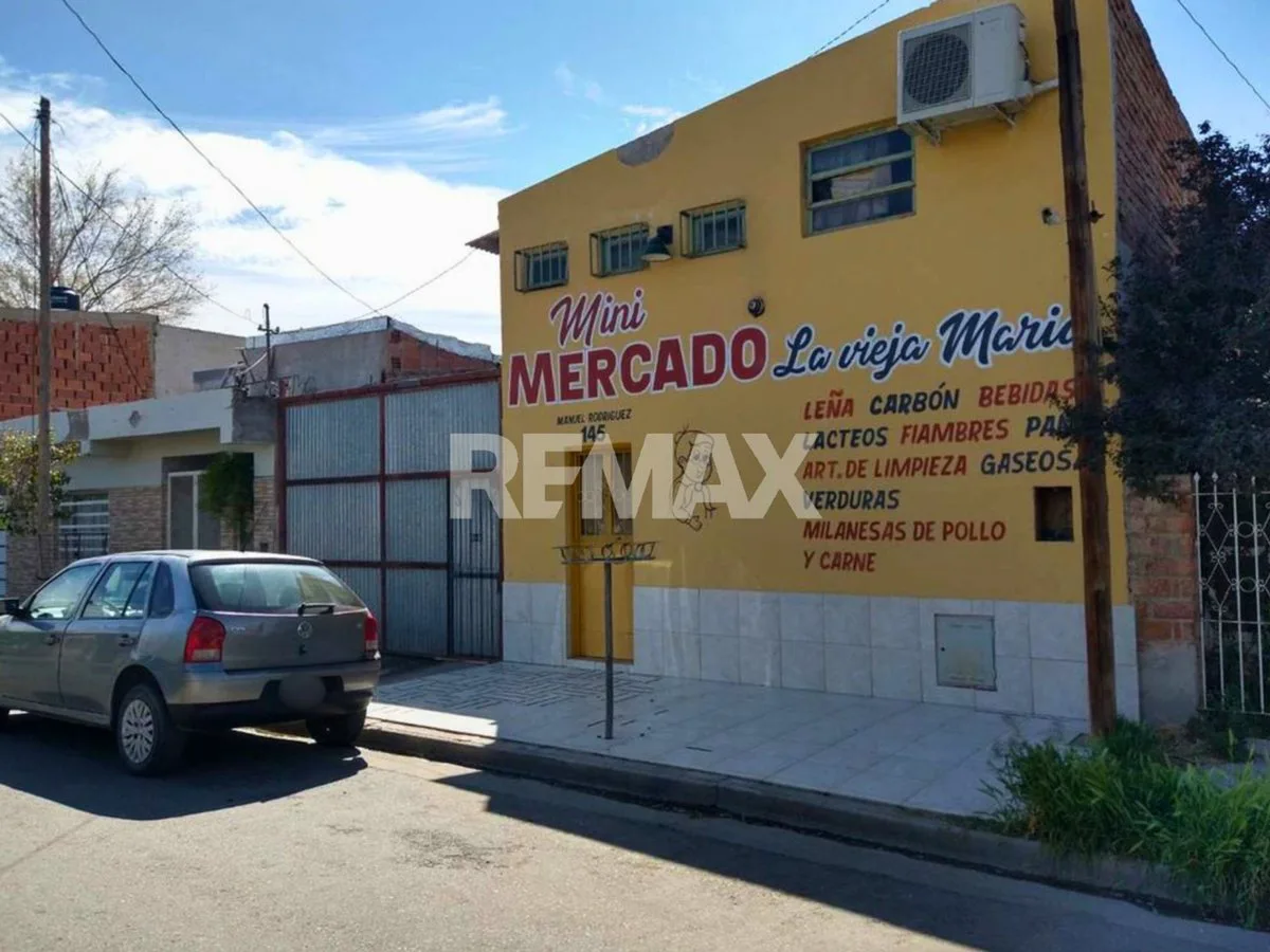 VENTA CASA 2 DORM + SALON COMERCIAL + GALPÓN NQN foto 3