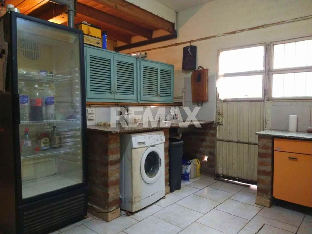 VENTA CASA 2 DORM + SALON COMERCIAL + GALPÓN NQN foto 4
