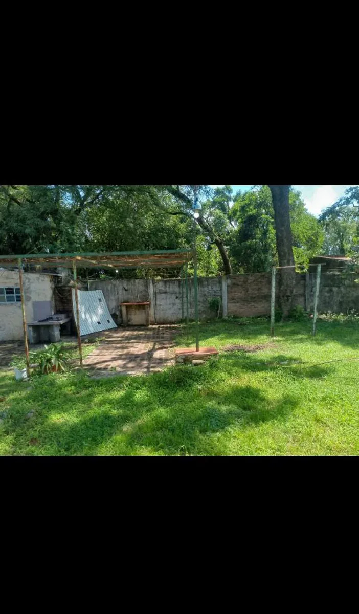 CASA CON GRAN TERRENO Y DEPOSITO A REFACCIONAR foto 3