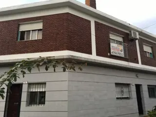 Solido E Impecable PH de 5amb. en Planta Alta foto 1