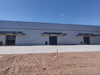 Excelente galpon en alquiler Parque industrial Ciudad Industria Funes foto 3