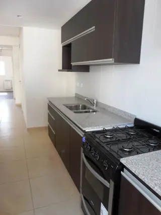 BELGRANO 1350 SEMIPISO DE 2 AMBIENTES CON COCHERA A ESTRENAR. foto 1