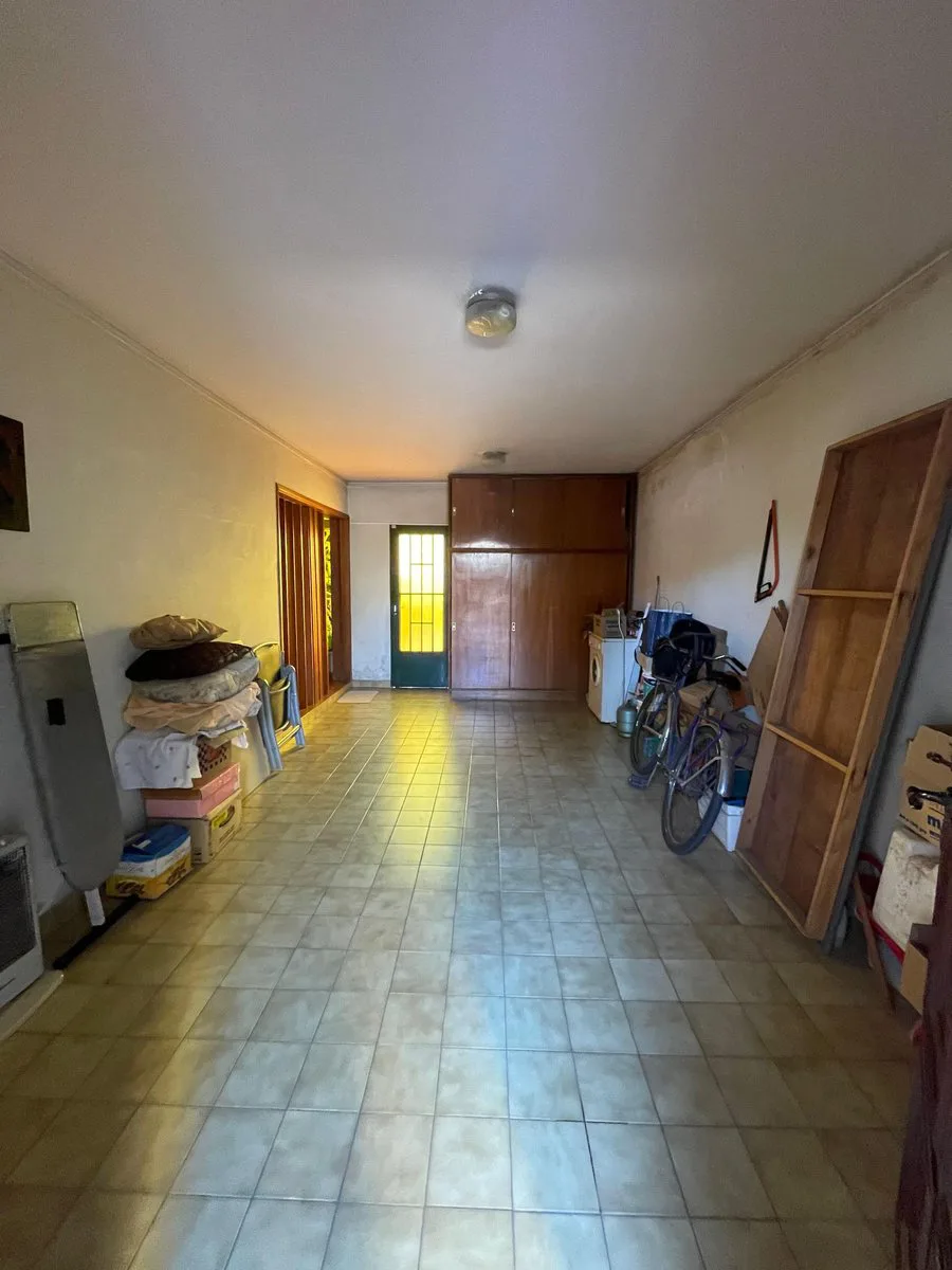 CASA 4 DORMITORIOS  JARDIN 2 COCHERAS TIRO SUIZO foto 3