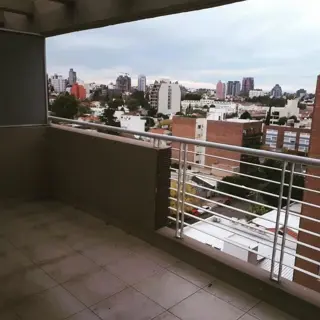 Departamento 2 dormitorios con cochera foto 1