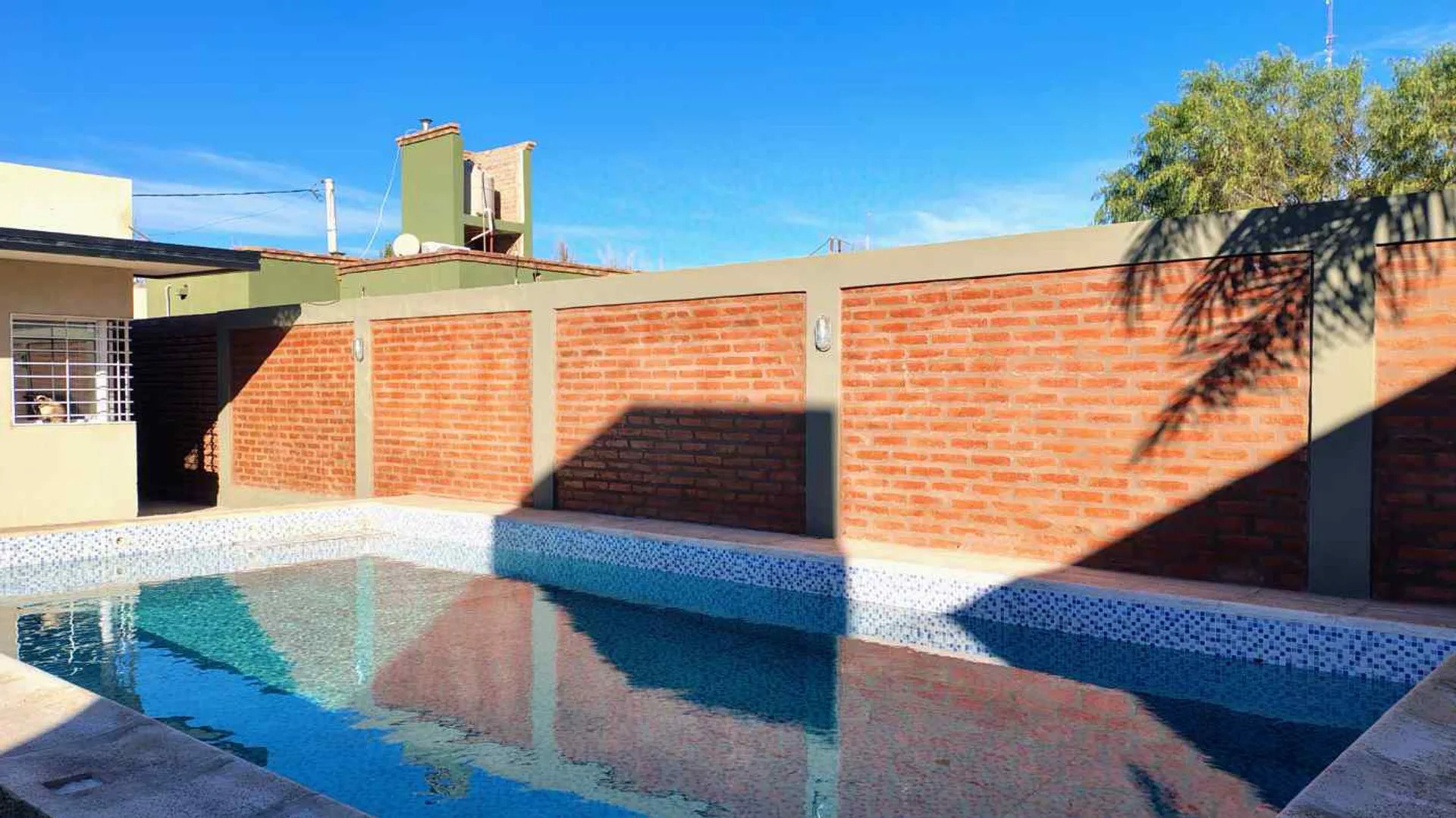 CASA CON QUINCHO Y PILETA B° PRIVADO SANTA LUCIA foto 5