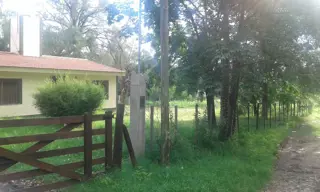 VENTA CASA Y FRACCIÓN DE TIERRA foto 1