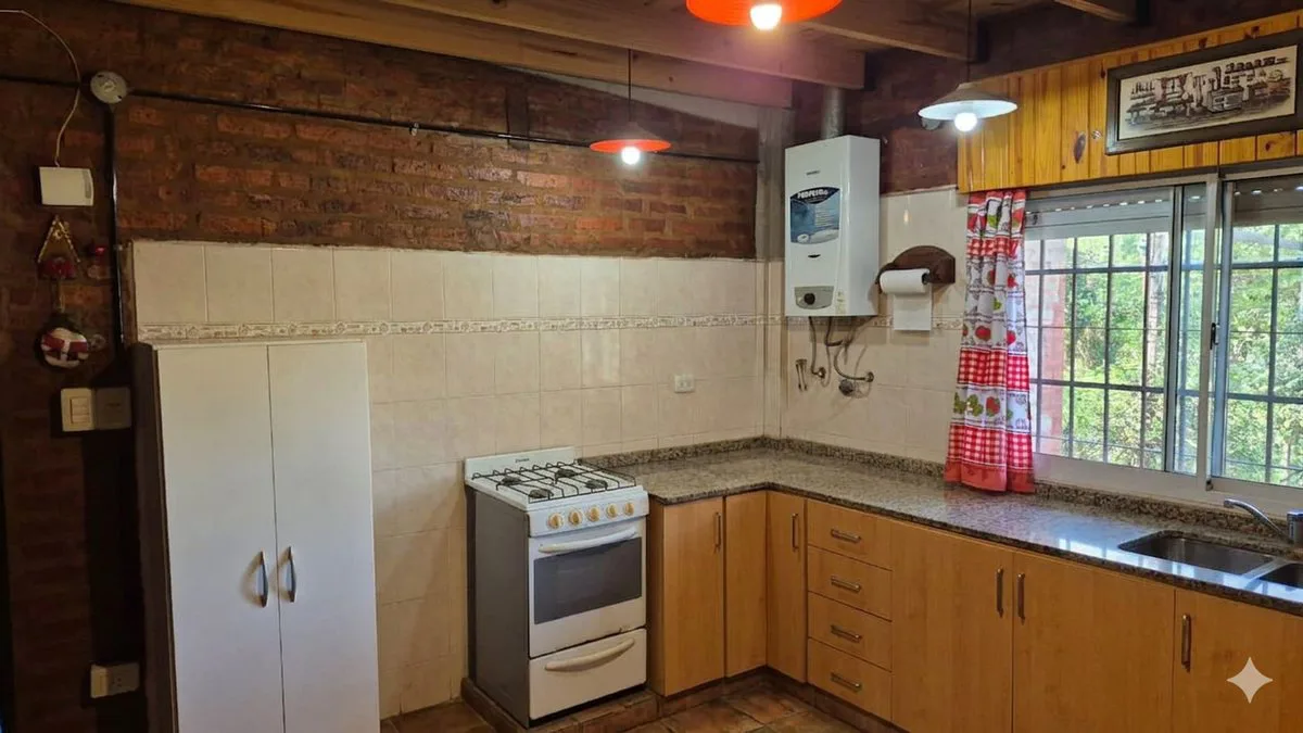 VENTA CASA QUINTA EN EZEIZA -AMPLIO LOTE Y QUINCHO foto 4