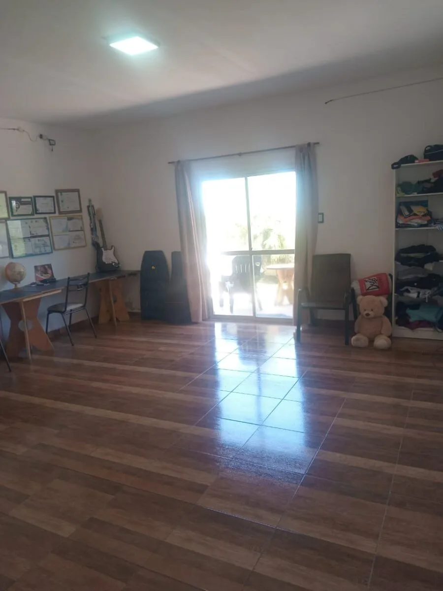 VENTA CASA SOBRE RUTA 3 EXCELENTE ENTORNO VISTA A LAS SIERRAS foto 3