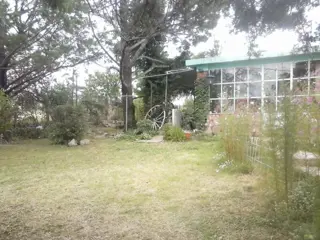 EXCELENTE CASA DE 3 AMBIENTES MAS DPTO DE 1 AMBIENTE A POCAS CUADRAS DE LA TECHADA DE CAPILLA DEL MONTE SOBRE LOTE DE 700 METROS foto 2