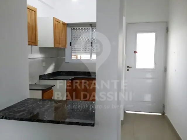 BURZACO: VENTA DE 2 DPTOS ,2 AMBIENTES COMODOS, LUMINOSOS, CON COCHERA Y PATIO ( VENTA EN BLOQUE )