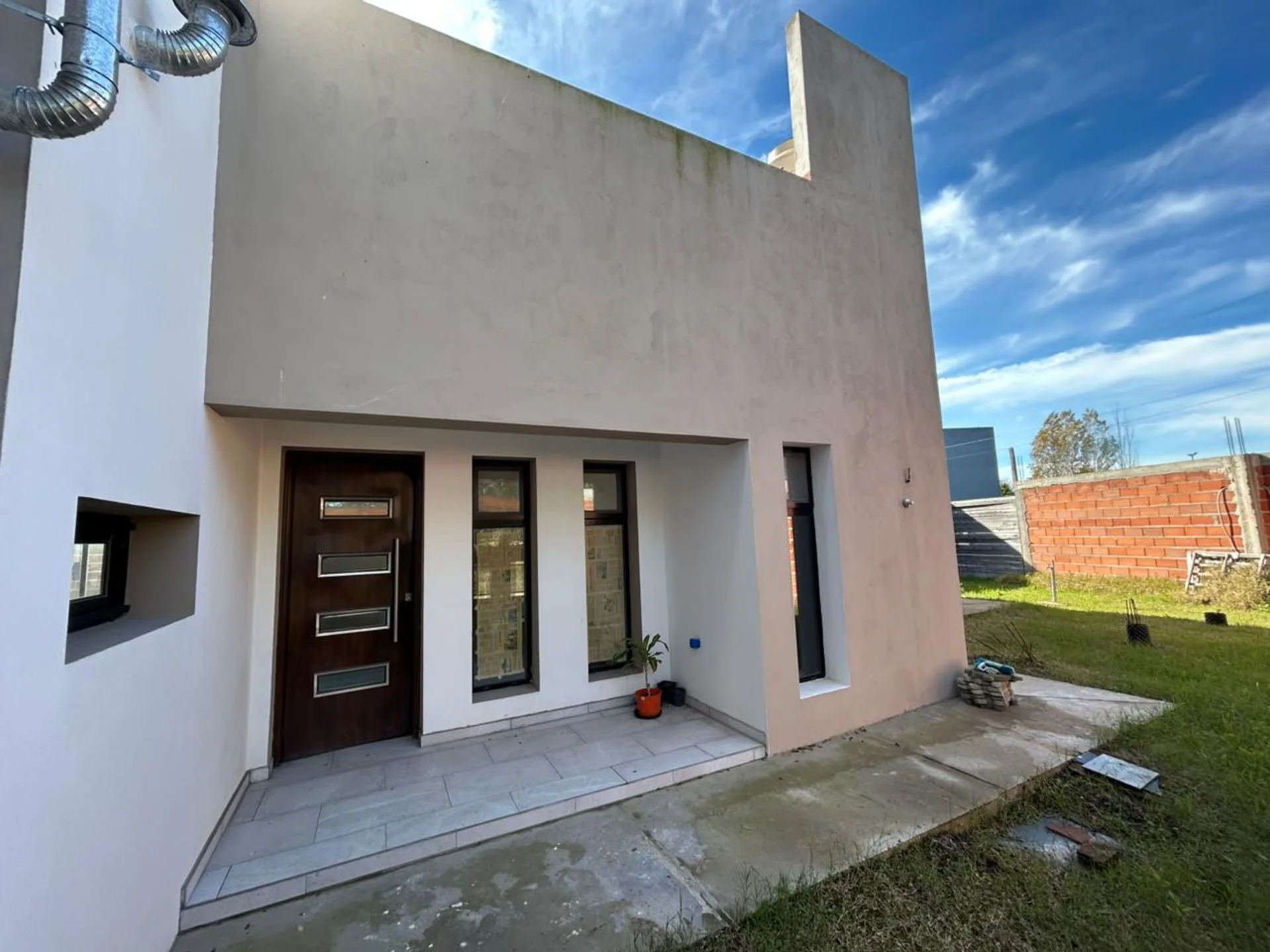CASA 2 DORMITORIOS EN VENTA GONNET A TERMINAR foto 3