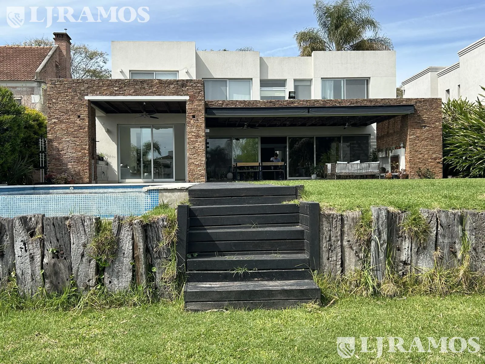 Casa a la laguna, con 4 dormitorios, escritorio y play, en venta o alquiler en Santa Barbara foto 3